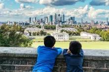 Two boys on wall photo