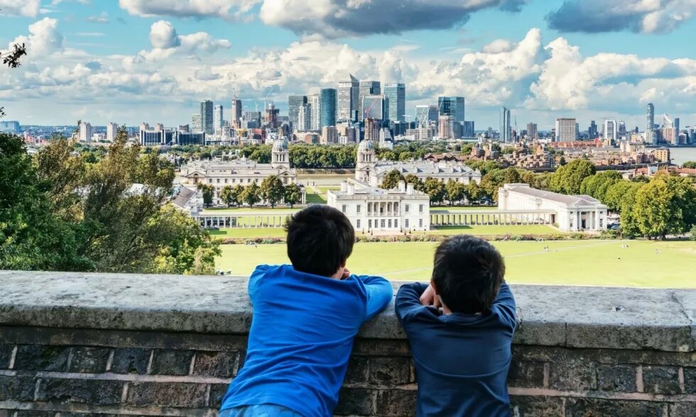 Two boys on wall photo